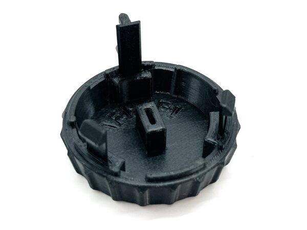 Black replacement speed control knob for Hella Marine Turbo fan, back view showing brass T contactor mount