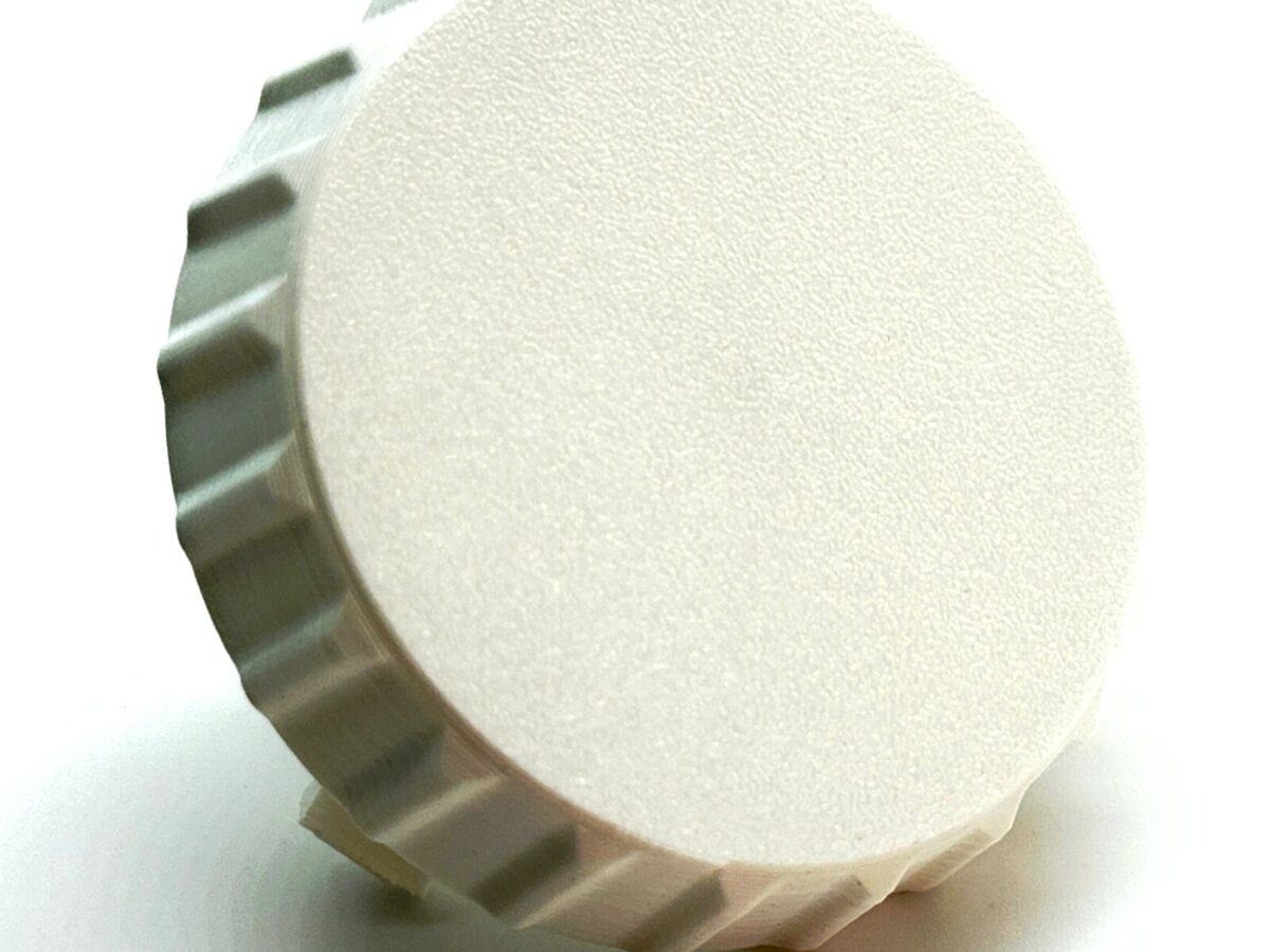 White replacement speed control knob for Hella Marine Turbo fan, front view