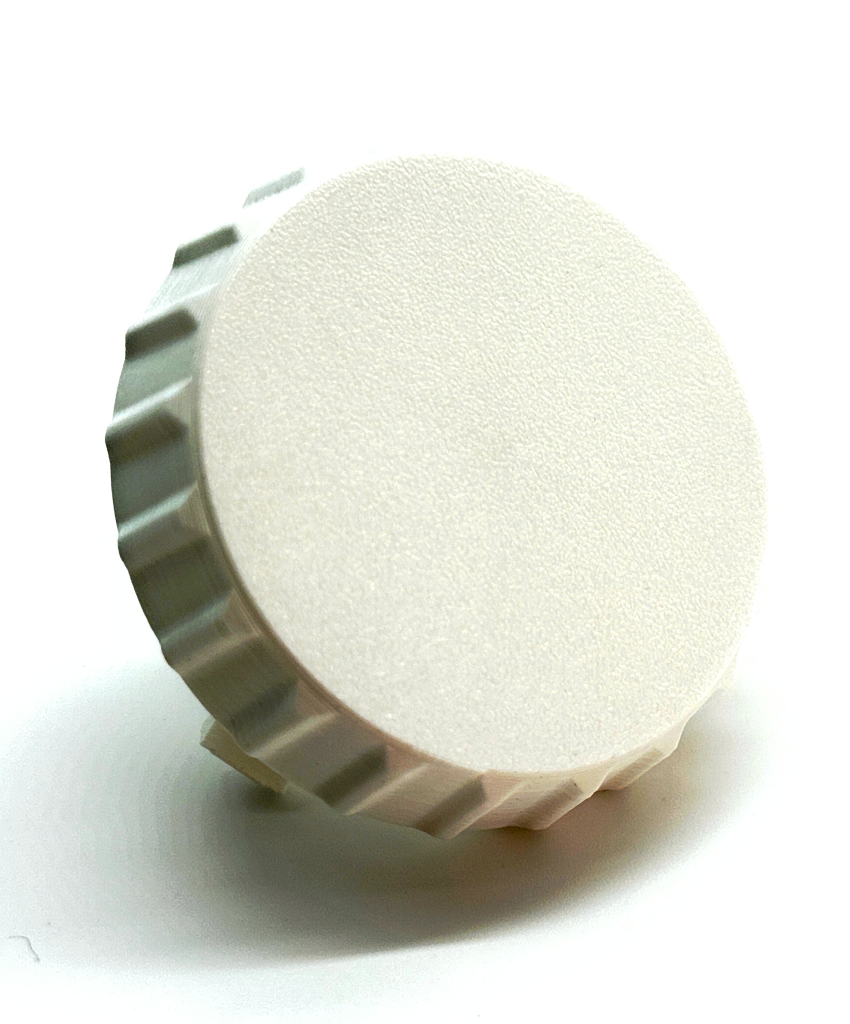 White replacement speed control knob for Hella Marine Turbo fan, front view